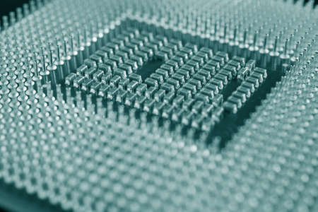 computer processor close-up. Dark blue green tinted background or backdrop. Wallpaper on the theme of information technology. A pattern of contacts and semiconductors of a microprocessor. Macroの写真素材