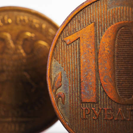 Russian coin 10 rubles, closeup fragment. Ruble tens on both sides. Economy, central bank and money of Russia. bank and credit. Microfinance company and micro loan. square illustration. Macroの写真素材