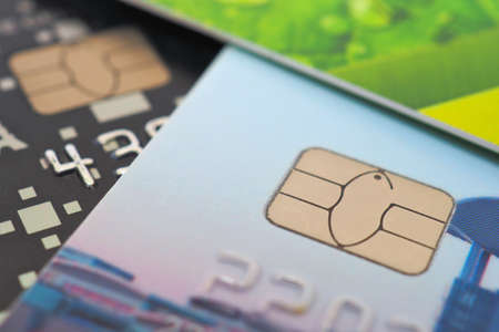 Bank cards of different payment systems close-up