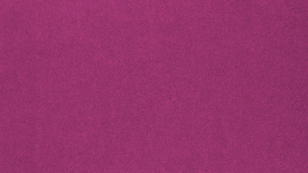 Dark pink colored paper texture. Tinted wallpaper. textured background. Small patterned surface. Fibers and irregularities. top-downの写真素材