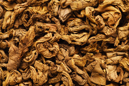 Dried tea leaves close-up. Natural background, brown, bright, saturated, textured. Macroの写真素材