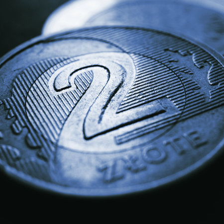 Translation: 2 zloty. Fragment of Polish two zloty coin closeup. National currency of Poland. Dark blue tinted square illustration for news about banking or finance. money and banking. Macroの写真素材