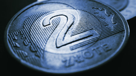 Translation: 2 zloty. Fragment of Polish two zloty coin close-up. National currency of Poland. Dark blue tinted illustration for news about economy or finance. polish money. Macroの写真素材