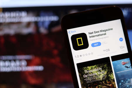 Los Angeles, California, USA - 26 November 2019: Nat Geo Magazine icon on phone screen with logo on...