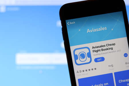 Los Angeles, California, USA - 26 November 2019: Aviasales icon on phone screen with logo on blurry background, Illustrative Editorial.のeditorial素材