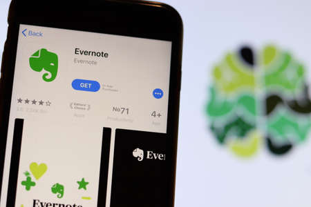 Los Angeles, California, USA - 26 November 2019: Evernote icon on phone screen with logo on blurry background, Illustrative Editorial.のeditorial素材