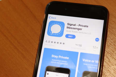 Phone with Signal - Private Messenger logo on screen top view close-up. Los Angeles, California, USA - 9 November 2019, Illustrative Editorial.のeditorial素材