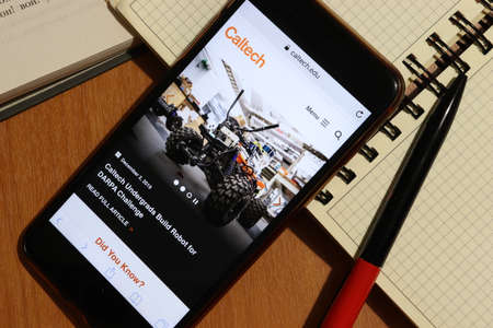Los Angeles, California, USA - 7 December 2019: Phone screen with California Institute of Technology Caltech website page top view. Higher education admission concept, Illustrative Editorial.のeditorial素材