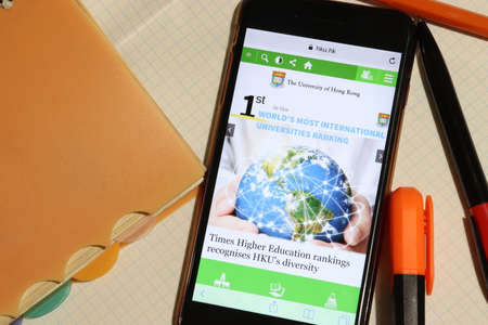 Los Angeles, California, USA - 7 December 2019: Mobile phone screen with University of Hong Kong website page close-up. Higher education admission and overview concept, Illustrative Editorialのeditorial素材