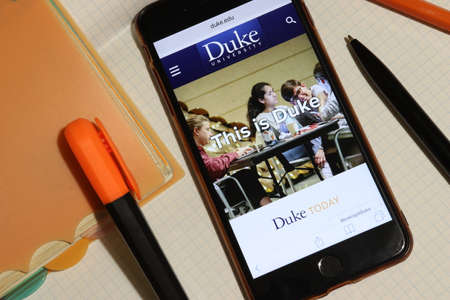 Los Angeles, California, USA - 7 December 2019: Mobile phone screen with Duke University website page close-up. Higher education admission and overview concept, Illustrative Editorialのeditorial素材