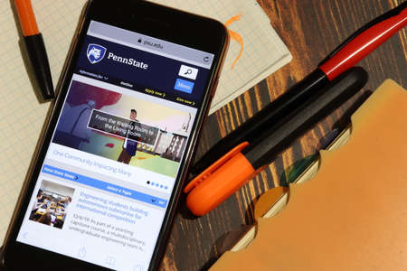 Los Angeles, California, USA - 7 December 2019: Mobile phone screen with Pennsylvania State University website page close-up. Higher education admission and overview concept, Illustrative Editorialのeditorial素材