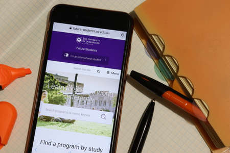 Los Angeles, California, USA - 7 December 2019: Mobile phone screen with University of Queensland website page close-up. Higher education admission and overview concept, Illustrative Editorial.のeditorial素材