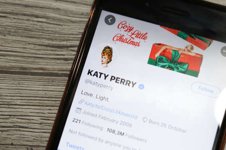 Los Angeles, California, USA - 18 December 2019: Katy Perry account on Twitter on phone screen,...