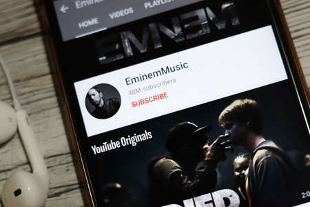 Los Angeles, California, USA - 18 December 2019: Eminem Music YouTube channel icon on phone screen...