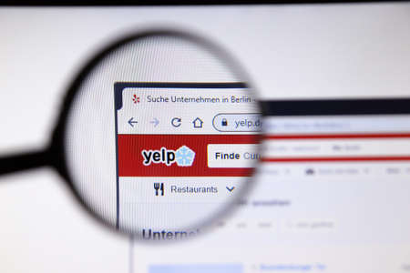 Los Angeles, California, USA - 19 December 2019: Yelp website page. Yeko.com logo on display screen close-up, Illustrative Editorial.のeditorial素材