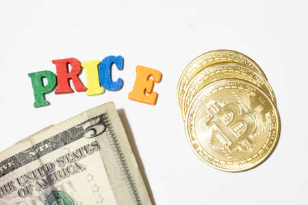Price of bitcoin concept. Coins and money on white background with word price made with letterboard.の写真素材