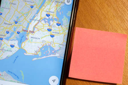 Map of New York city on phone screen close-up top view with copy space.の写真素材
