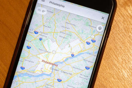 Saint-Petersburg, Russia - 10 January 2020: Map of Philadelphia city on phone screen close-up top view with copy space, Illustrative Editorial.のeditorial素材