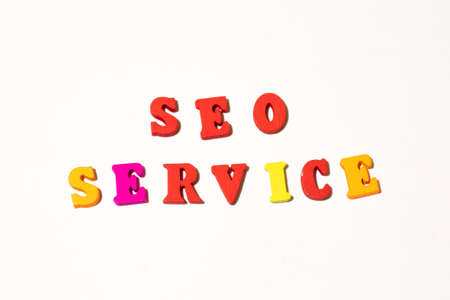 Word SEO service letter board on white background. Flat lay for illustration.の写真素材