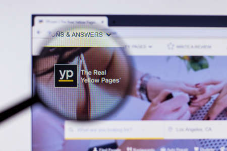 Saint-Petersburg, Russia - 10 January 2020: Yellow Pages YP website page on laptop display with...