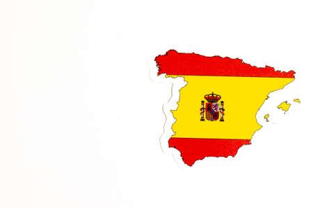 National flag of Spain. Country outline on white background with copy space. Politics illustration.の写真素材