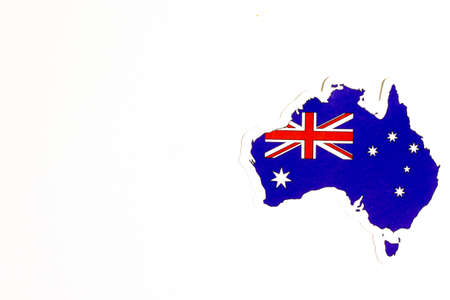 National flag of Australia. Country outline on white background with copy space. Politics illustration.の写真素材