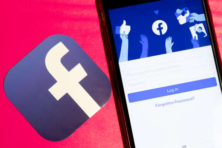 Los Angeles, California, USA - 22 January 2020: Facebook app logo and phone with icon close up on...