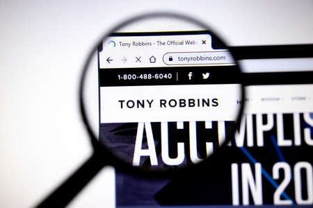 Los Angeles, California, USA - 25 January 2020: Tony Robbins website page. Tonyrobbins.com logo on display screen, Illustrative Editorial.のeditorial素材