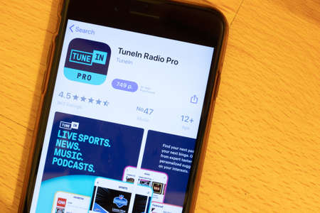 Los Angeles, California, USA - 12 February 2020: TuneIn Radio Pro App Store page close up , Illustrative Editorial.のeditorial素材