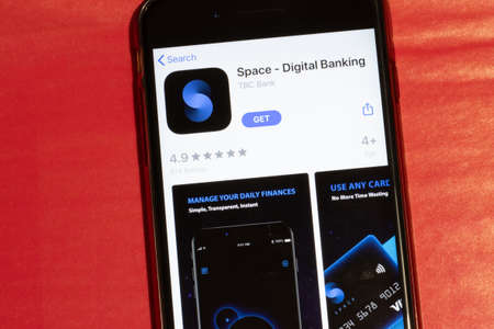 Los Angeles, California, USA - 12 February 2020: Space Digital Banking icon on phone screen top view, Illustrative Editorial.のeditorial素材