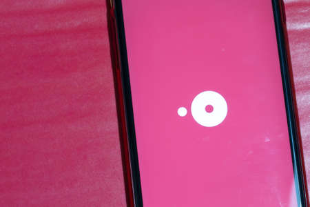 Los Angeles, California, USA - 12 February 2020: OpenTable app icon on phone screen top view, Illustrative Editorial.のeditorial素材