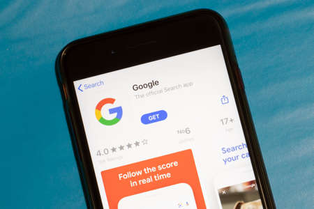 Los Angeles, California, USA - 12 February 2020: Google app icon on phone screen top view, Illustrative Editorial.のeditorial素材