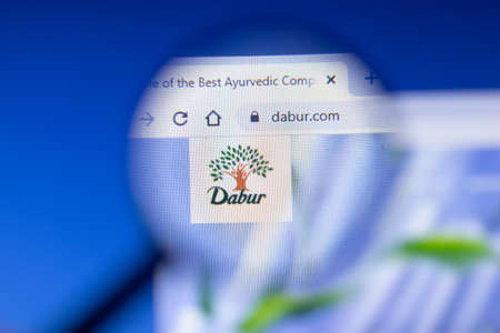 Saint-Petersburg, Russia - 18 February 2020: Dabur company website page logo on laptop display. Screen with icon, Illustrative Editorial.のeditorial素材