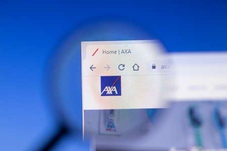 Saint-Petersburg, Russia - 18 February 2020: AXA company website page logo on laptop display. Screen...