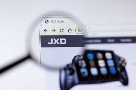 Saint-Petersburg, Russia - 18 February 2020: JXD company website page logo on laptop display. Screen...