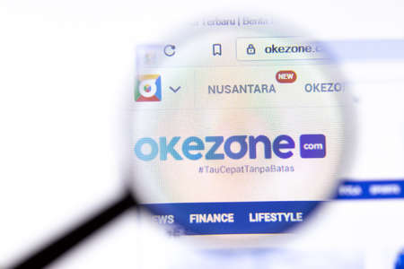 Los Angeles, California, USA - 18.02.2020: Okezone website page with close up logo. Okezone.com site icon on screen, Illustrative Editorial.のeditorial素材