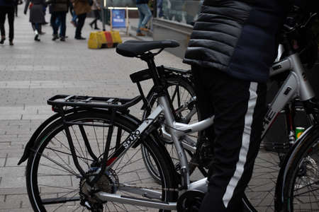 Helsinki, Finland - 3 March 2020: Man on bike on street , Illustrative Editorial.