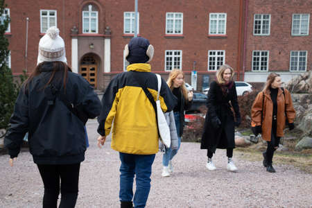 Helsinki, Finland - 3 March 2020: European tourists walking , Illustrative Editorial.のeditorial素材