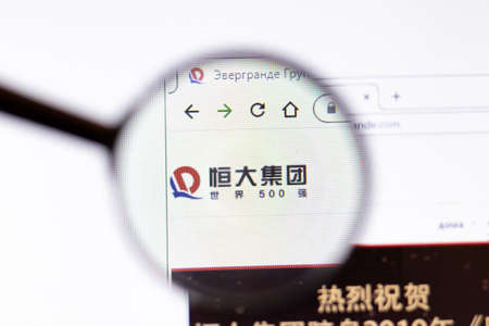 Los Angeles, California, USA - 15 March 2020: China Evergrande Group icon on website page. Evergrande.com logo visible on display screen, Illustrative Editorial.のeditorial素材