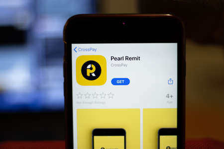Los Angeles, California, USA - 16 April 2020: Pearl Remit logo on screen close up. App store icon...