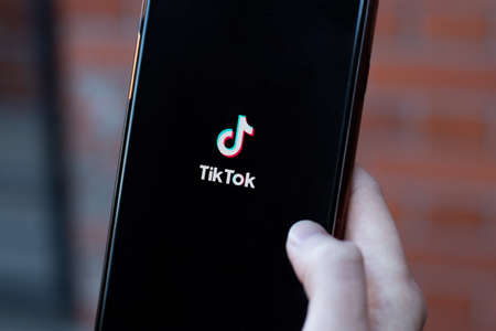New York, USA - 1 May 2020: TikTok app logo close-up on phone screen, Illustrative Editorialのeditorial素材