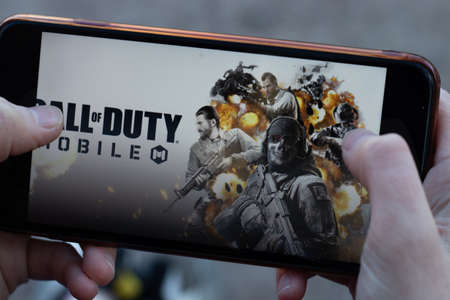 New York, USA - 1 May 2020: Call of Duty Mobile app logo close-up on phone screen, Illustrative...