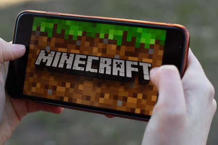New York, USA - 1 May 2020: Minecraft game app logo close-up on phone screen, Illustrative Editorial.のeditorial素材