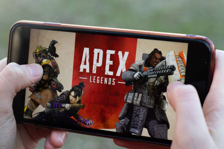 New York, USA - 1 May 2020: Apex Legends game app logo close-up on phone screen, Illustrative Editorial.のeditorial素材