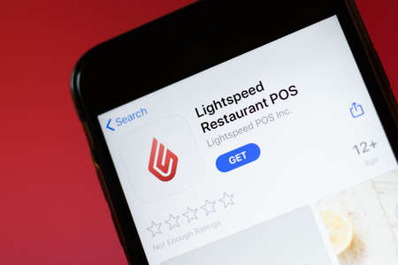 Moscow, Russia - 1 June 2020: Lightspeed Restaurant POS app mobile logo close-up on screen display, Illustrative Editorialのeditorial素材