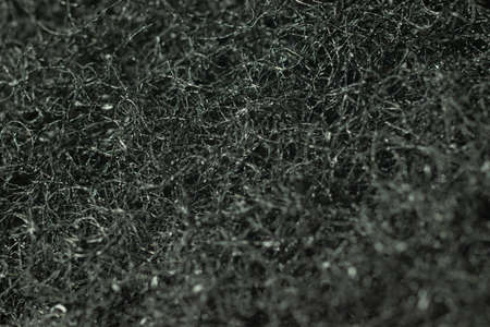 Black unusual texture background with textured surface.の写真素材