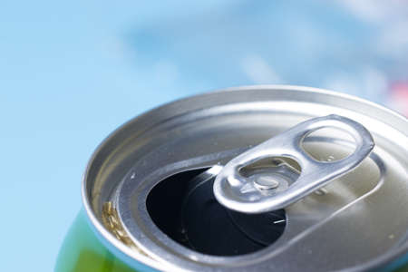 Open can of fresh beverage like coke or soda, copy space.