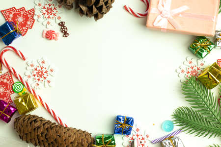 Christmas flat lay background with copy space. Top view of New Year decoration on white background.