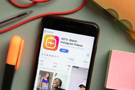 New York, USA - September 29, 2020: IGTV Watch Instagram Videos mobile app logo on phone screen close up, Illustrative Editorial.のeditorial素材
