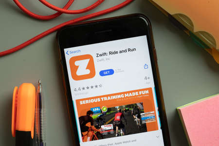 New York, USA - September 29, 2020: Zwift Ride and Run mobile app logo on phone screen close up, Illustrative Editorial.のeditorial素材